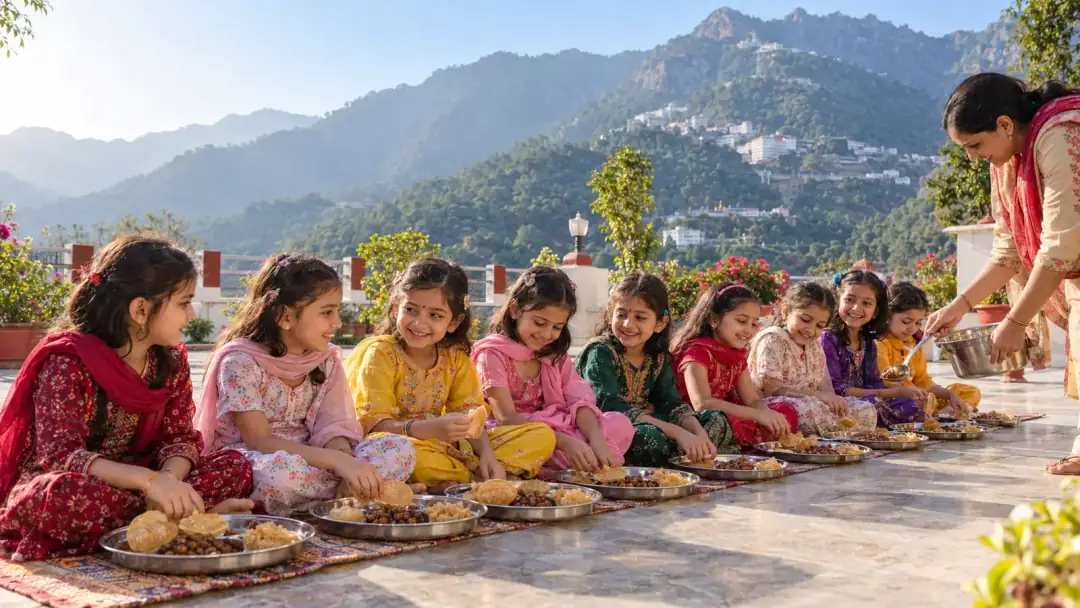 Young girls served puri, chana and halwa with the Trikuta hills behind